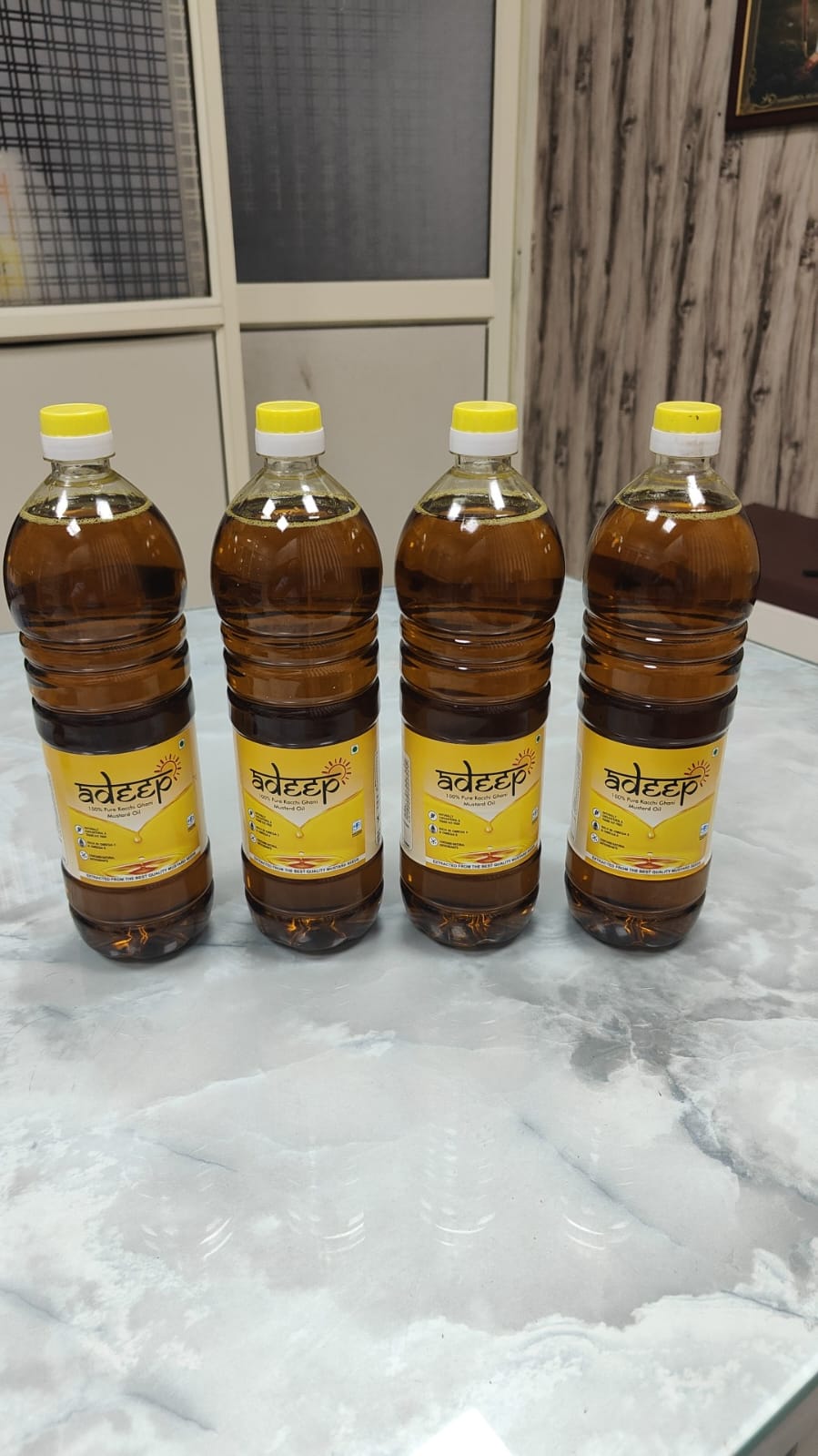 adeep 100% Pure Kacchi Ghani Mustard Oil bottles