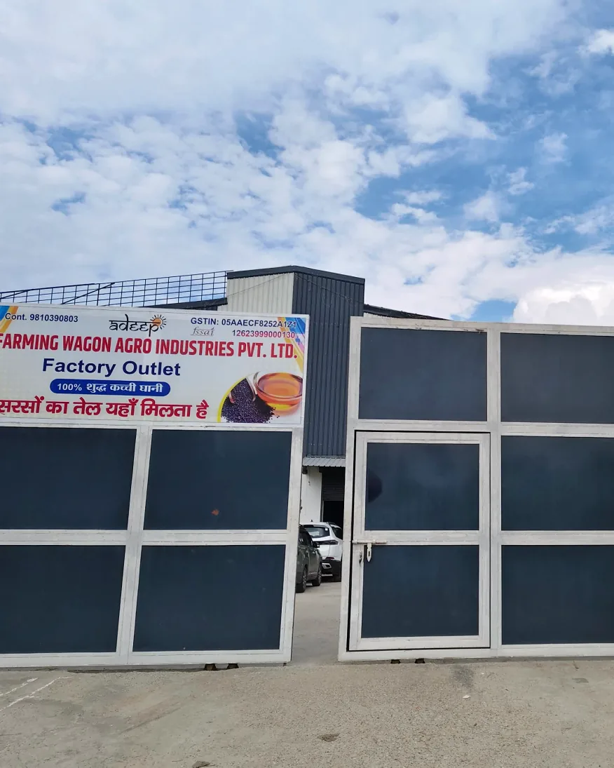 The plant gate at Gummawala with the factory outlet board